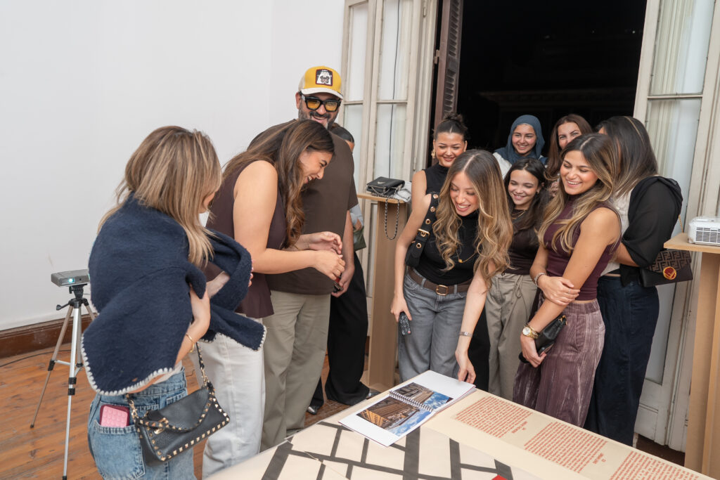 Visitors experiencing interactive and multimedia projects developed through cross-disciplinary collaboration.